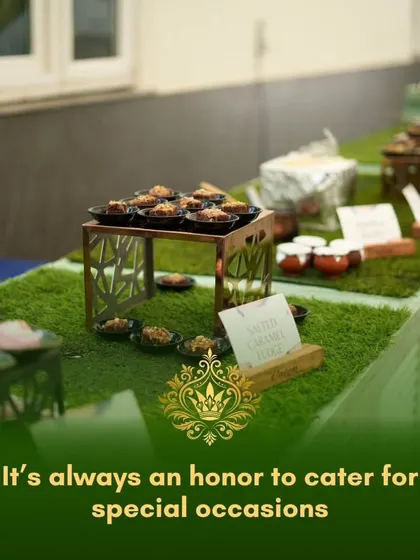 It's always an honor to cater for special occasions. This image shows our beautifully arranged dessert table with Salted Caramel Fudge, set up on a turf-like surface for a unique presentation.