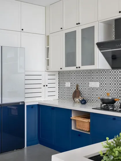 This angle shows how we integrated the refrigerator with matching blue paneling, creating a seamless and cohesive look.