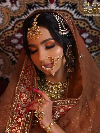 A close up of the Heeramandi inspired look. The eyes are closed to show the beautiful gradient of the eyeshadow and the precise application of the liner.