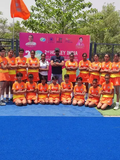The Sub-Junior Women's team with their coaches, ready to compete at the Hockey India National Championship. This is a crucial step in their development as competitive athletes.