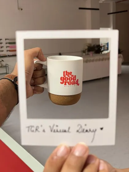 A fun shot from our visual diary, framing our custom-branded mug. We love finding creative ways to showcase our products.
