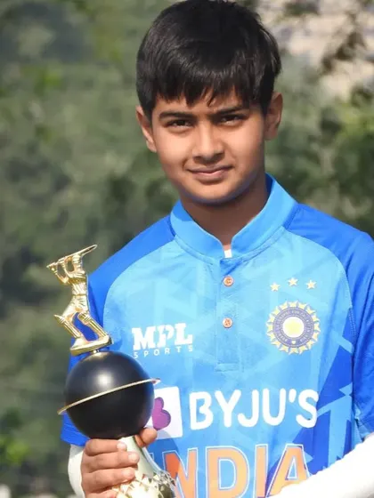 This young cricketer in his India jersey with a trophy is a picture of aspiration. This is the dream we nurture.