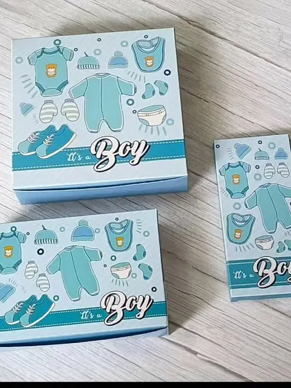 I believe beautiful announcements shouldn't break the bank. These are my budget-friendly 'It's a Boy' themed boxes, perfect for filling with my handmade chocolates or other small treats.