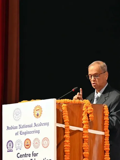 Another angle of Shri Narayana Murthy's speech, showing his presence at the podium. I provide a variety of shots to give a comprehensive view of the event.