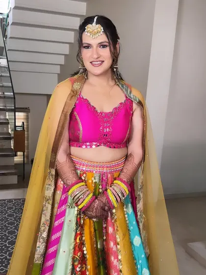 A full view of Muskan's vibrant Haldi outfit. The makeup is bright and fresh, perfect for a fun and festive daytime event.