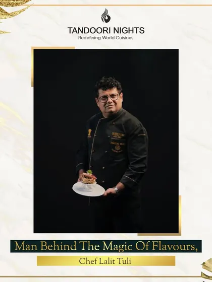 The man behind the magic of flavors, Chef Lalit Tuli, holding a plate of his creations, embodying the spirit of our brand.