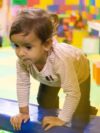 This little explorer is on a mission, crawling and discovering all the fun textures and structures in our toddler-friendly play zone.