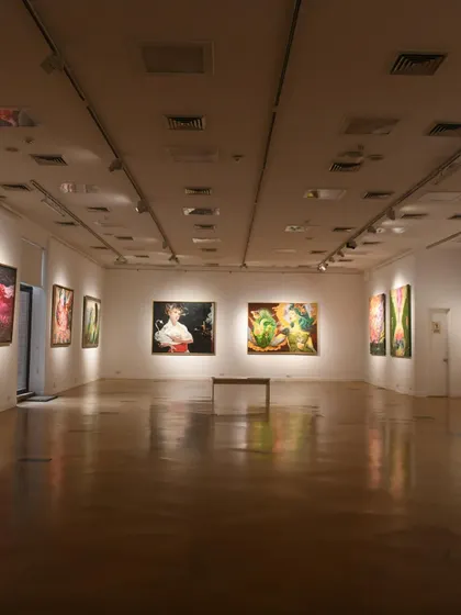 Another view of the gallery space, showing how the different paintings create a visual dialogue with each other.
