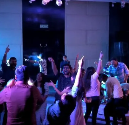 A moment of pure fun and energy at a corporate party.