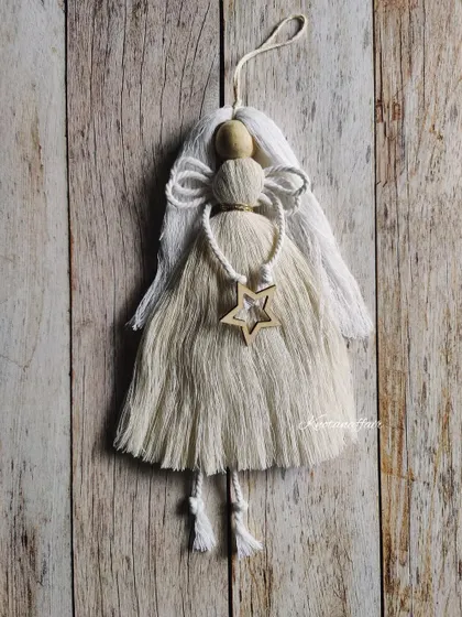 A beautiful macrame angel ornament, perfect for your Christmas tree. This was a custom order and adds a delicate, handmade touch to festive decorations.