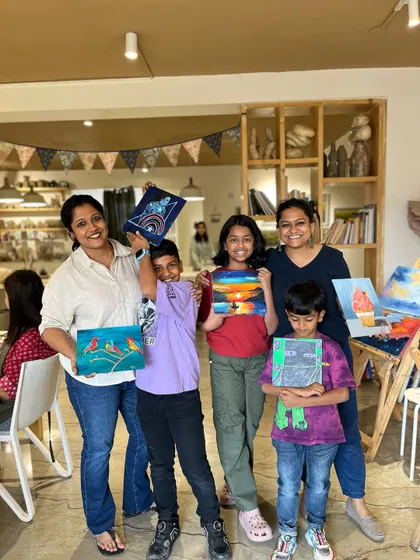 A group of friends and family showing their diverse artworks. From landscapes to abstract designs, everyone found something they loved creating.