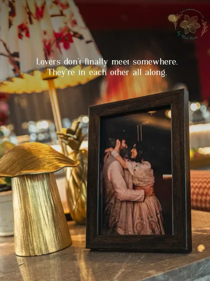 "Lovers don't finally meet somewhere. They're in each other all along." A framed photo of a couple, a simple reminder of the love story at the center of it all.