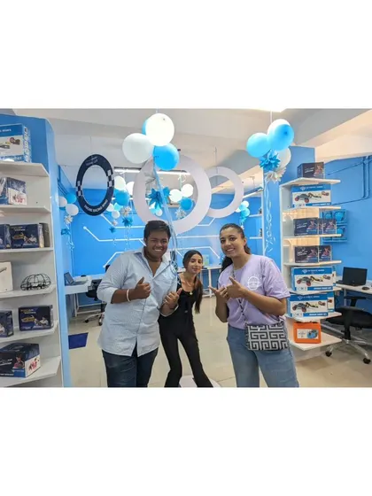 The happy team and partners at the Nagpur center launch, giving a thumbs-up for their new venture.