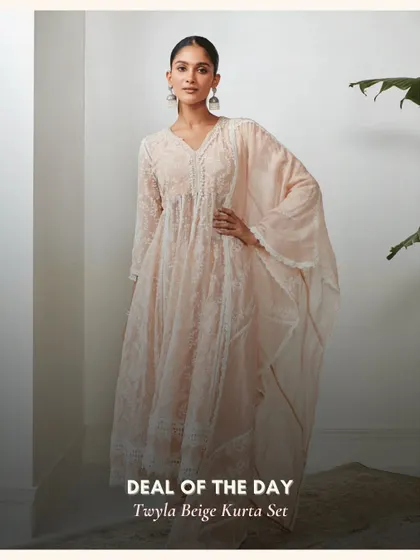 Another look at the Twyla Beige Kurta Set. The delicate lace and gathered waist add a touch of romance to this beautiful, neutral-toned outfit.