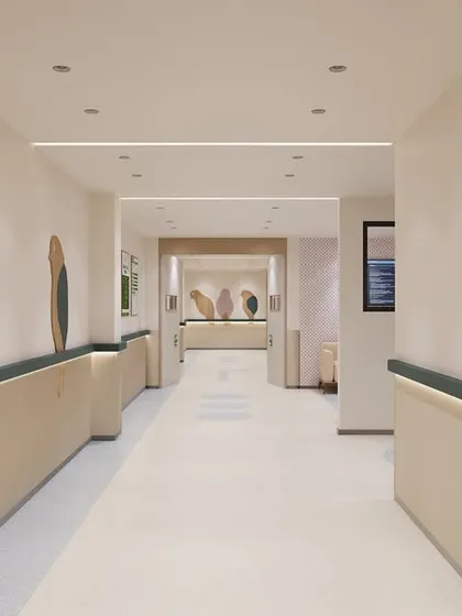 Another perspective of the pediatric ICU corridor, showing how the bird motifs are integrated along the wall. This biophilic-inspired art serves as a positive distraction and a simple wayfinding element, making the space feel friendly and less clinical.