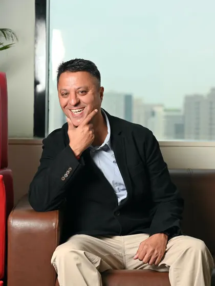 A candid, laughing portrait of a CEO. This kind of shot is fantastic for showing the human side of a leader and making them more relatable to their team and clients.