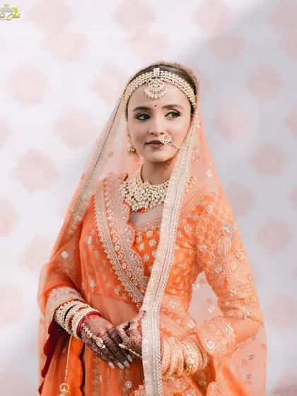 A classic three-quarter portrait of the bride. Her confident gaze and elegant posture make this a powerful and beautiful image.