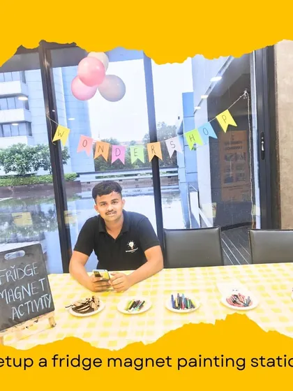 Here's our host at the fridge magnet painting station, ready for a fun-filled afternoon. We ensure our team is prepared and enthusiastic to make the party a success.