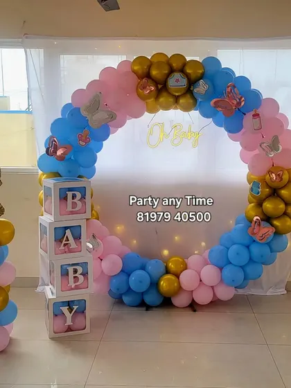 Another view of the pink and blue "Oh Baby" decoration.