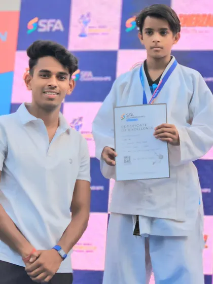 A proud moment with my student and his certificate of excellence at the SFA Championship.