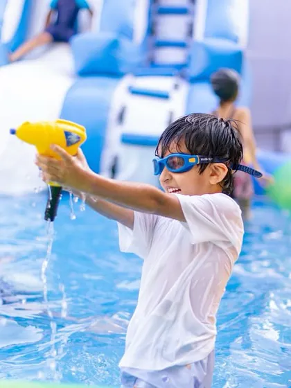 A water gun fight in action. I plan parties where kids can be kids and have the time of their lives.