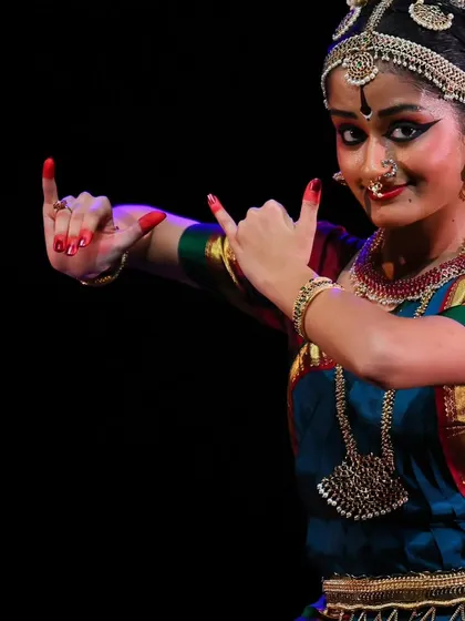 Srujana's expressive hands and face telling a story. The language of mudras is rich and complex, and mastering it is a significant part of a dancer's training.
