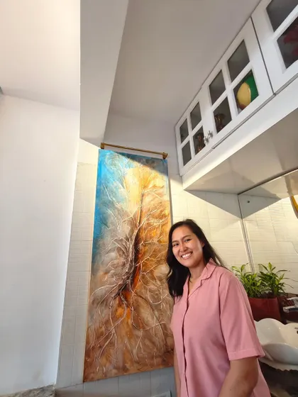 We love connecting our clients with the creators behind the art. Here are some moments from our gallery, featuring talented artists like Isha Valentine and happy visitors exploring our exhibitions.