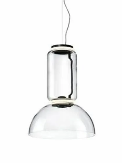 This Flos Noctambule inspired pendant is composed of stacked glass modules, a low cylinder, and a bowl. The transparent design makes it almost invisible during the day, while at night it transforms into a luminous glass sculpture.