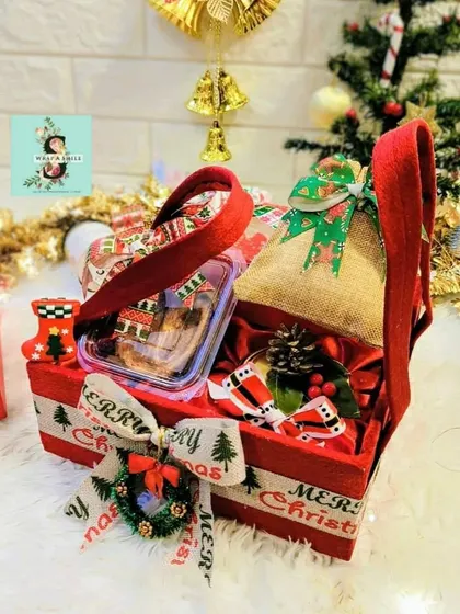 My Christmas Santa delectable hamper. This festive red basket is filled with cookies and other treats, perfect for a Secret Santa gift or just to spread some holiday joy.