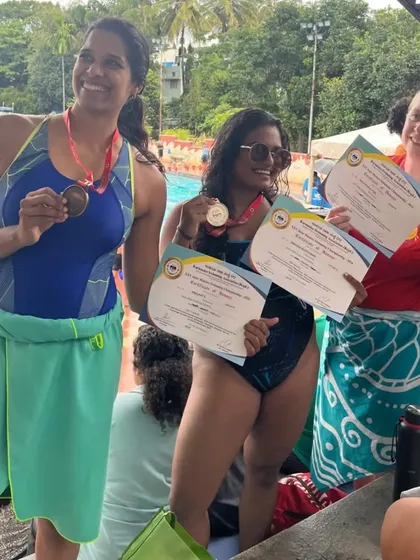 Proudly showing off our medals and certificates. Competing as an adult is a fantastic experience, and we encourage everyone to try it.