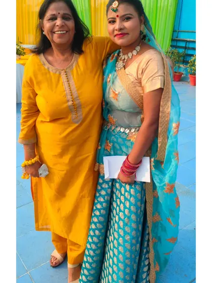Sharing a smile with a client at an event. We pride ourselves on building positive and supportive relationships with everyone we work with.