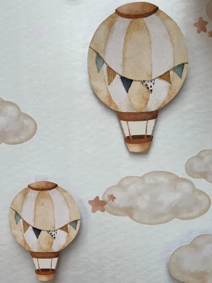 A close-up of the hand-painted watercolor style hot air balloon cutouts used on the main backdrop, showing our attention to artistic detail.