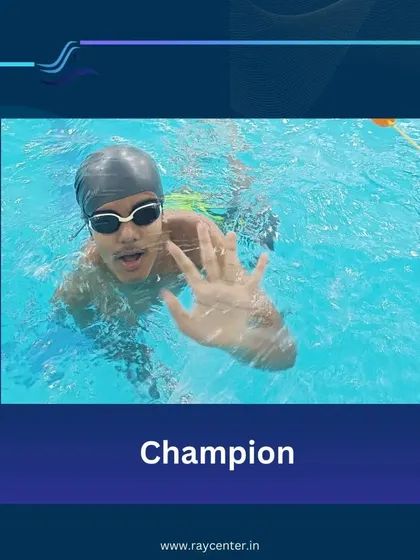 A confident young swimmer waves to the camera, embodying the champion spirit I encourage in all my students.