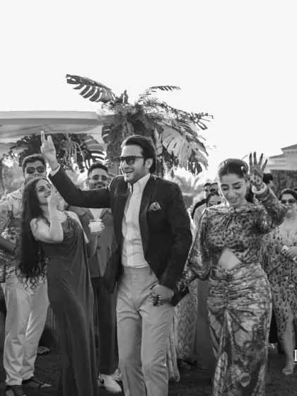 A black and white shot capturing the lively dance floor at the Cuban Jazz brunch. The theme encouraged a fun, carefree atmosphere that got everyone moving.