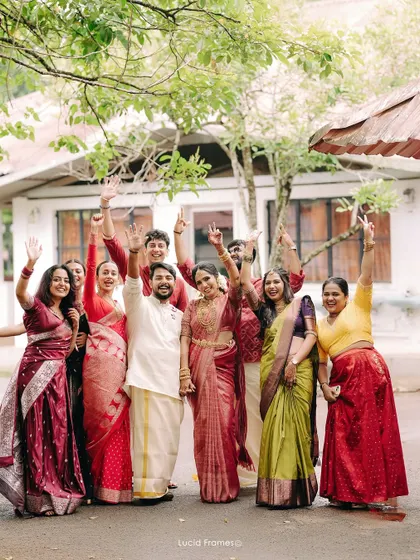 The entire wedding party celebrating together, a perfect memory of the love and support surrounding the couple.
