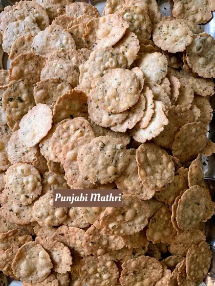 Crispy and flavorful Punjabi Mathri. This savory, flaky biscuit is a classic Indian tea time snack that I make with a traditional recipe.