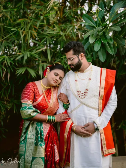 A moment of quiet comfort, with the bride resting her head on the groom's shoulder.
