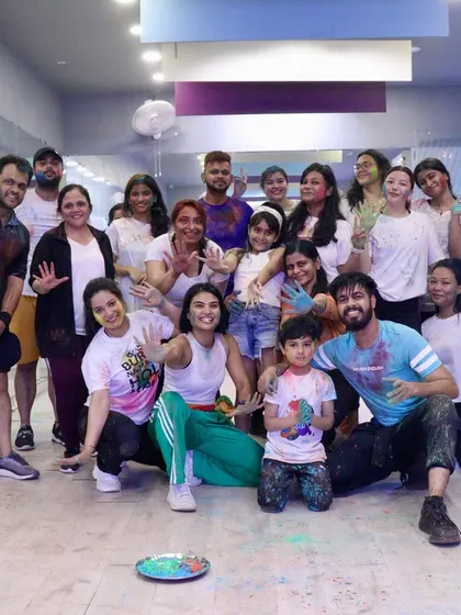 Another group shot from our Holi party inside the studio. We embrace the vibrant spirit of Holi, celebrating health and happiness together as a fitness community.