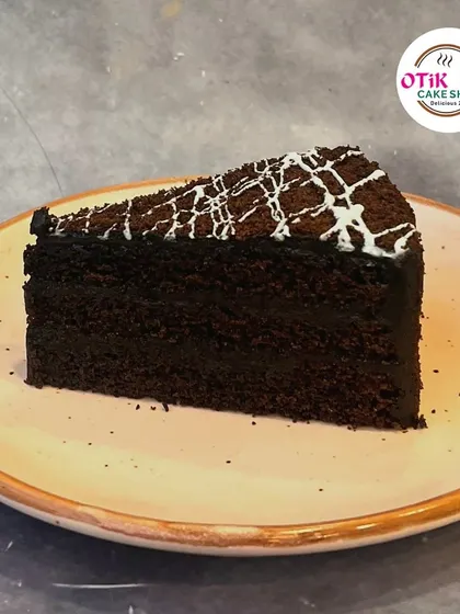 Our Dutch Truffle Pastry is for the serious chocolate lover. It features dense, moist chocolate cake layered with a rich and dark chocolate ganache for an intensely satisfying experience.