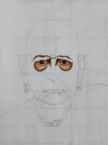 A work-in-progress shot of a commission to paint Swami Samarth. Here, I've just started blocking in the colors for the eyes, using the grid method for accuracy.