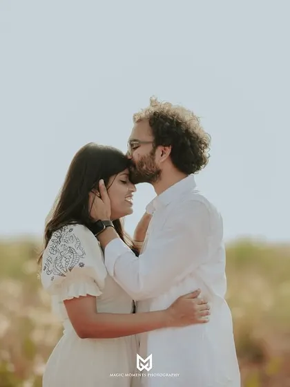A tender moment captured during Ankita and Rajat's pre-wedding session. A forehead kiss is a simple yet powerful expression of love and care.