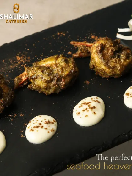 Welcome to the perfect seafood heaven. These succulent prawns are seasoned and cooked to perfection, then artfully plated with a creamy sauce, showcasing our skill with delicate flavors.