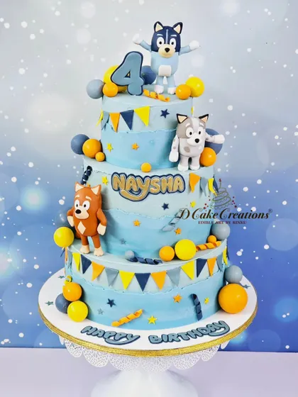 A fun, four-tier Bluey-themed cake for Naysha's 4th birthday. The cake features the beloved characters from the popular Australian cartoon.