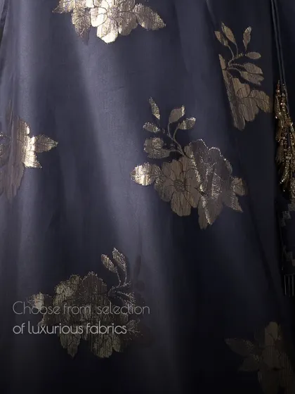 I allow you to choose from a selection of luxurious fabrics, like this beautiful organza with silver floral prints, to create your dream outfit.