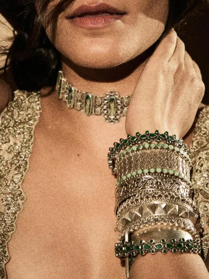 A closer look at the jewelry styling for Srishti. Stacking different styles of bracelets and bangles adds texture and personality to a traditional outfit.