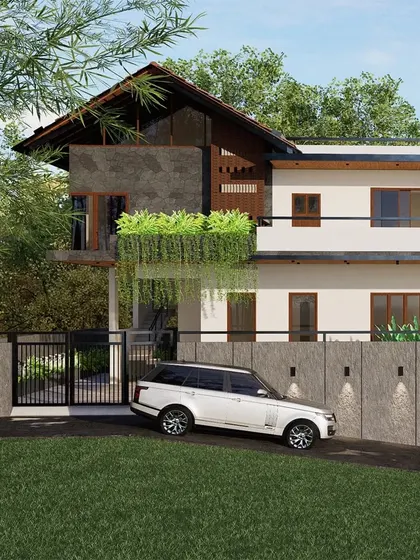 The residence is sculpted to the natural terrain, with lush plantings adorning balcony areas to merge the home with its surroundings. The composition balances solid and void, creating a dynamic yet harmonious facade.