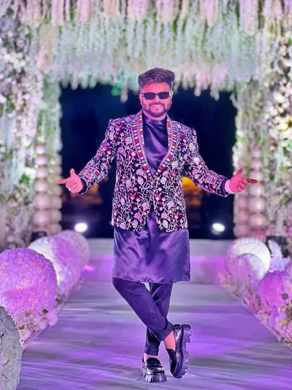 The grand entrance for a royal Rajasthan wedding. My traditional yet stylish attire is designed to complement the theme of the event.