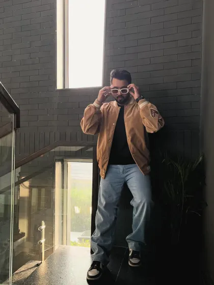 Adjusting my shades, because the future's bright. This casual outfit shows my everyday style, which is all about being cool, comfortable, and confident.