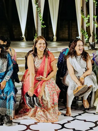 The joyous laughter of family members watching the Sangeet performances. Creating these shared moments of happiness is the best part of my job.