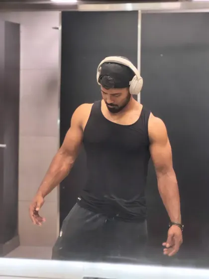 A quiet moment of reflection after training. The gym is my sanctuary, where I build myself physically and mentally.